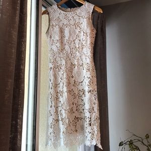 Women's White knee length dress.